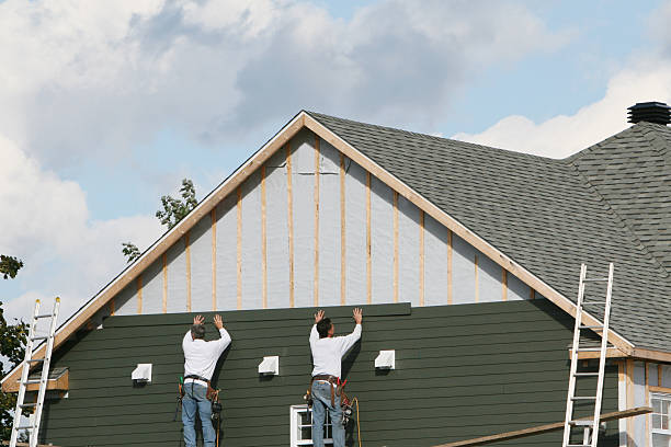Professional Siding technician working in Wyano, PA